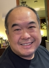 Photo of Dr Charlie Chung, Lothian AHP Stroke Strategic Lead, Consultant Occupational Therapist, and Long COVID Clinical Pathway Lead