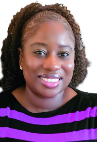 Cynthia Ndebele smiles at the camera