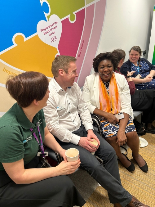 Odeth talking with Emma Dunn and Dermot Quinn from Belfast Trust 