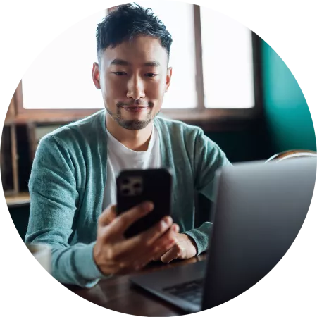 A man browses content on his smartphone