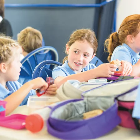 Image of children sharing food at school