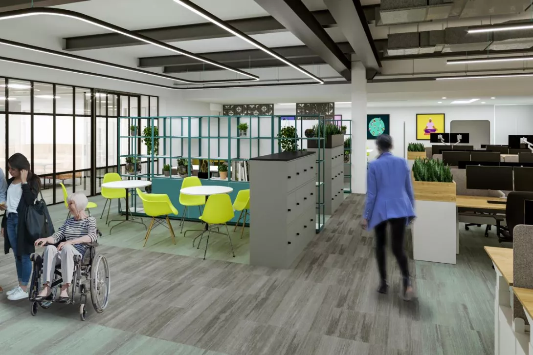 Picture of RCOT offices, featuring desks, lockers and colleagues working